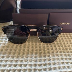 Tom Ford Black Frame Sunglasses with Gold Details